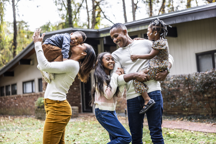 Parents with three children