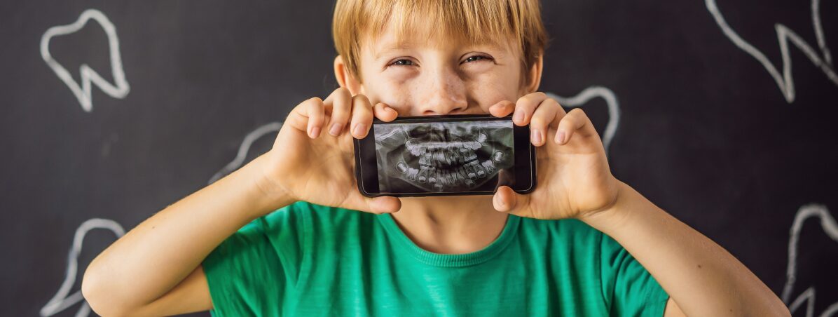 Child with images of his teeth